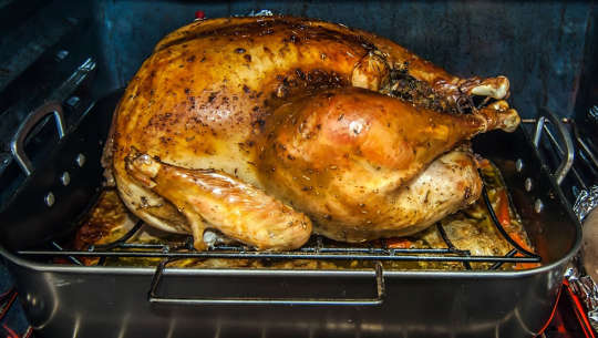 turkey roasting in the oven