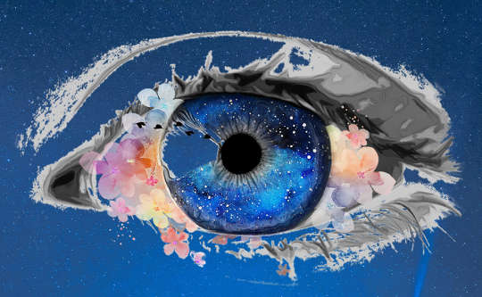 a blue eye overlaid on a starry sky