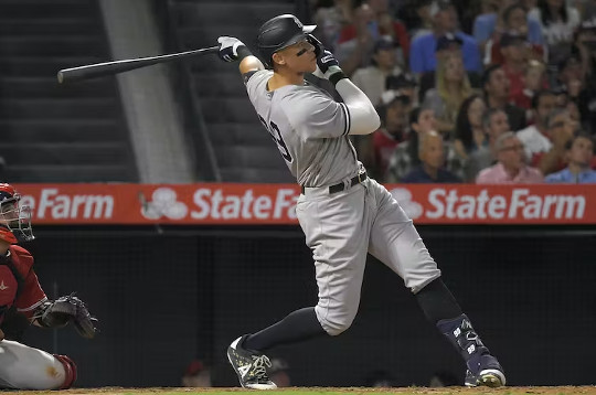 baseball player hitting a home run