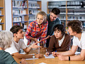 Students sharing stories about climate change and adaptation, highlighting the use of storytelling in education to connect young people with global climate issues.