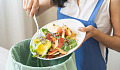 Image of fresh vegetables in a kitchen, illustrating tips for reducing food waste at home by planning meals and using leftovers effectively.