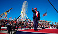 An image of Trump addressing crowds, symbolizing the rise of authoritarianism fueled by bigotry and racism.