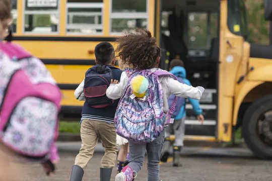 Some educators worry about the safety factor when transporting schoolchildren at dusk.