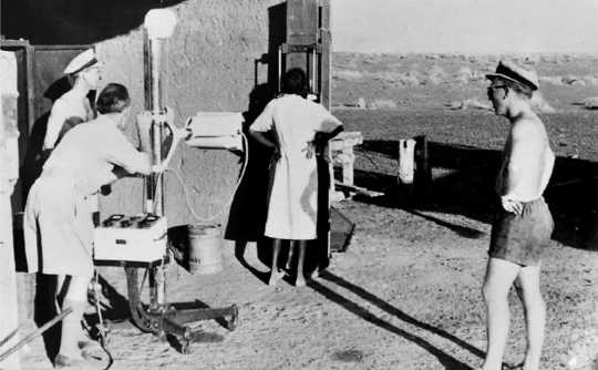 X-rays in the outback, part of mass screening for TB. (kissing can be dangerous how old advice for tb seems strangely familiar today)