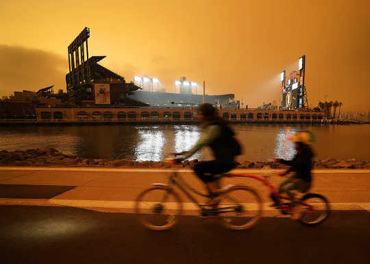 Smoke from wildfires turned the midday sky orange in San Francisco on Sept. 9, 2020.