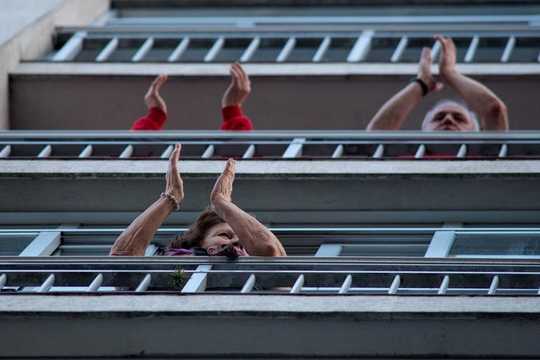 Why Clapping For Healthcare Workers Feels So Strangely Uplifting