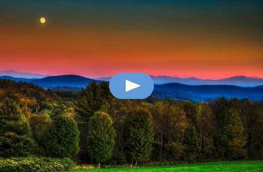 full moon over the mountains and forest of Vermont