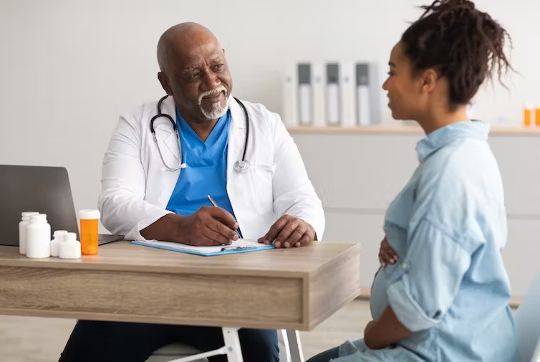 a woman talking to her doctor