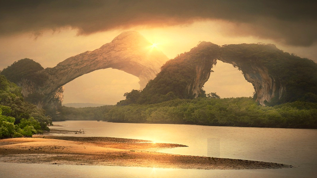 two natural archways on the other side of an expanse of water 