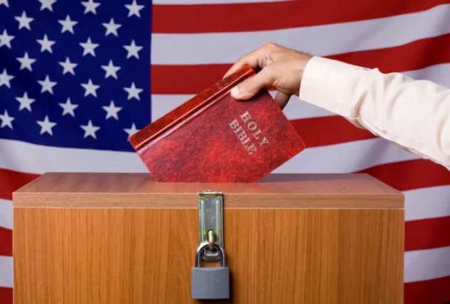 someone dropping a Bible into the ballot box in front of an American flag backdrop