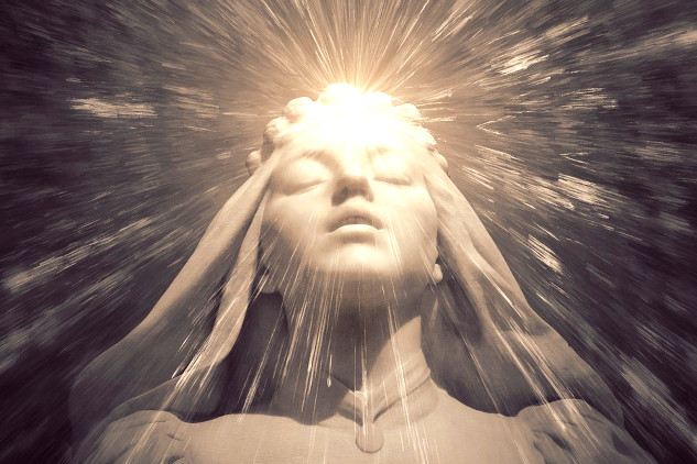 image of a woman with light radiating from her head