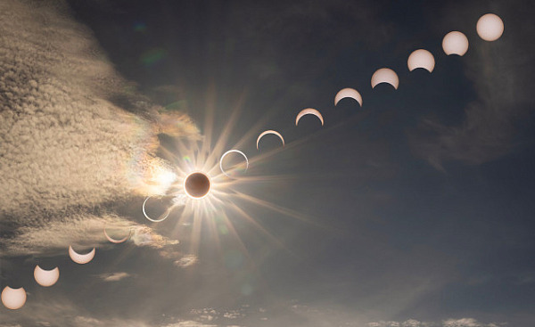 Composite photo of annular solar eclipse by MaryBeth Kiczenski