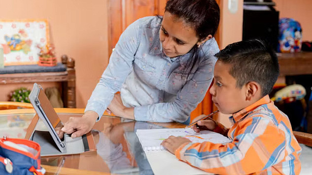 A family learning together at home, representing the rising trend in home education and the benefits it offers for personalized, flexible learning.