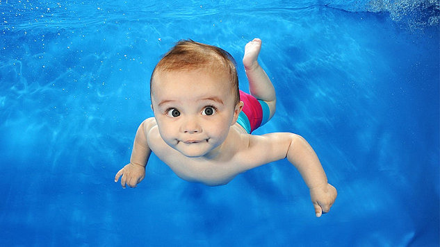 Person swimming underwater, emphasizing the importance of eye protection to prevent irritation and infection in chlorinated or saltwater environments.