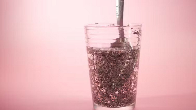 A glass of chia seed water with lemon slices, resembling the appearance of "tadpole water," highlighting its health benefits.