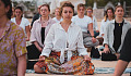 women sitting in meditation