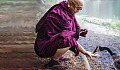 monk feeding a bird