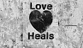 a heart with the words Love Heals