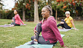 women exercise class in a park